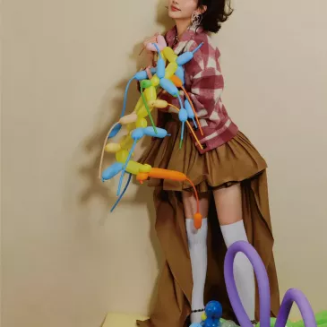 モン・ズーイー（孟子義）